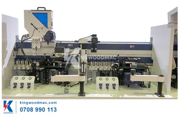 MÁY CẮT XÉN DÁN CẠNH TỰ ĐỘNG BĂNG TẢI DÂY ĐAI - MICHAEL 4CRB Lăn keo, ép nẹp của máy cắt xén dán cạnh tự động băng tải dây đai - MICHAEL 4CRB | Kingwoodmac