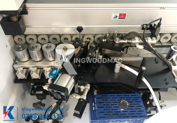 Cụm lăn keo ép nẹp thẳng máy dán cạnh thẳng nghiêng tự động | Kingwoodmac